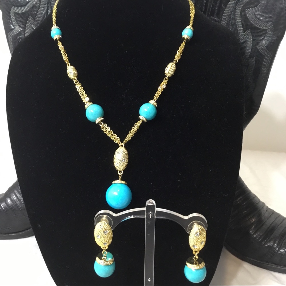 Turquoise colored and gold costume jewelry set.